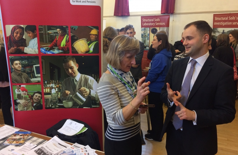 Luke talking to a representative of the local Jobcentre 