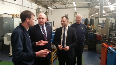 Luke and Tim during a tour of the factory