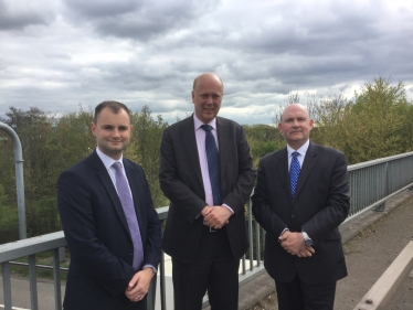 Luke Hall, Tim and Chris Grayling at the site